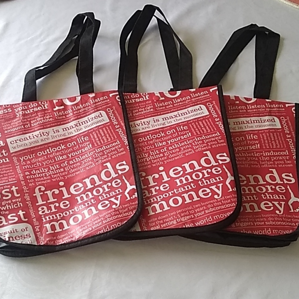 A set of three Lululemon shopping/reusable Bags
